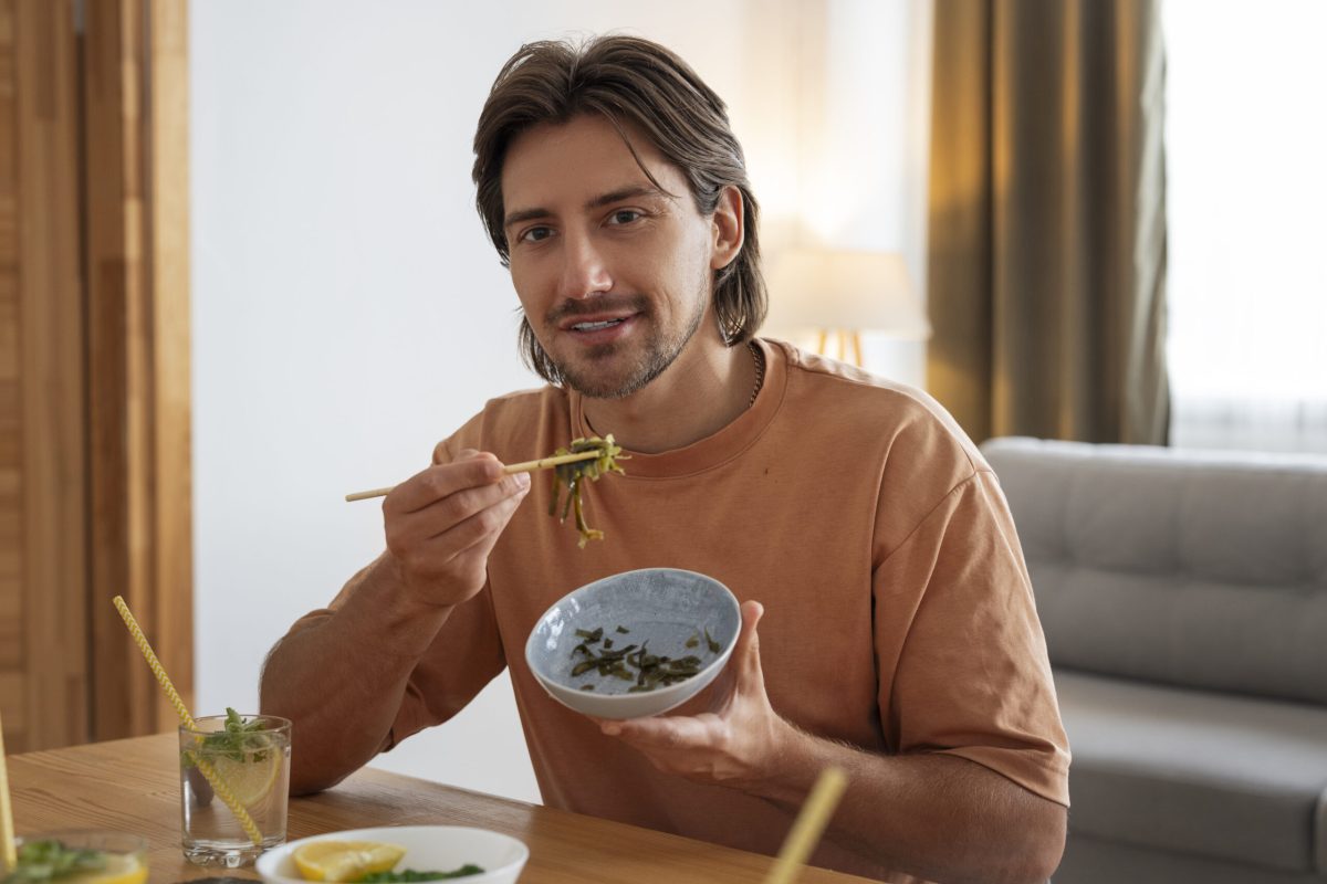 front-view-man-eating-seaweed-snacks mindful eating