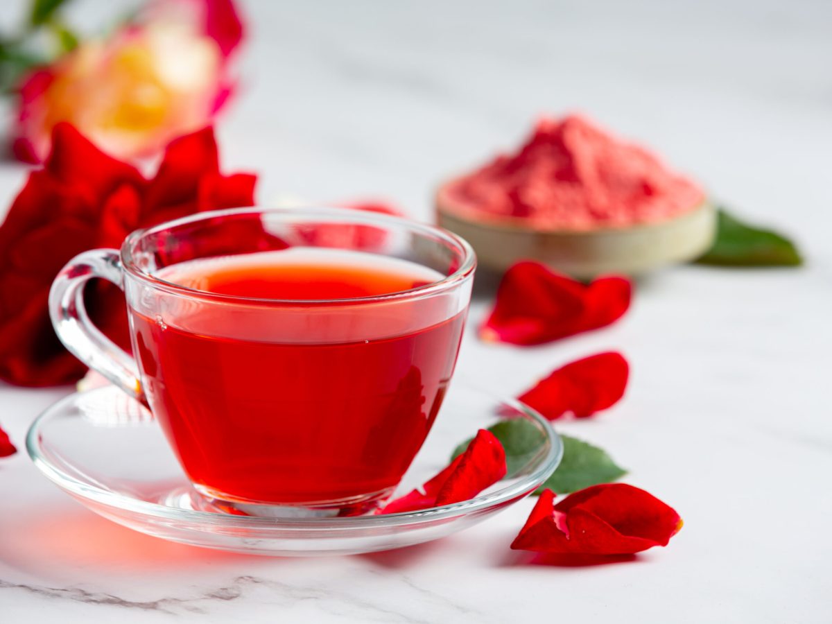 Hot rose tea on table herbal tea
