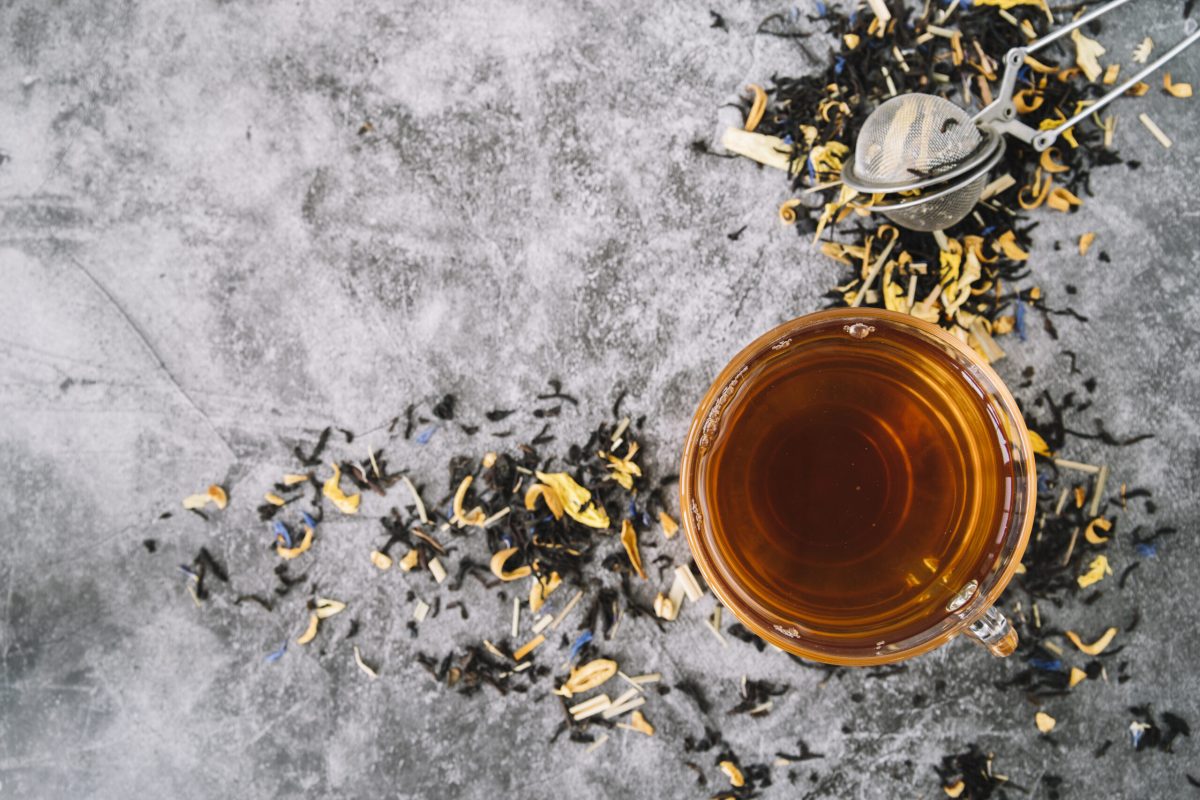 top-view-cup-tea-with-infuser-marble-background top-view-cup-tea-with-infuser-marble-background