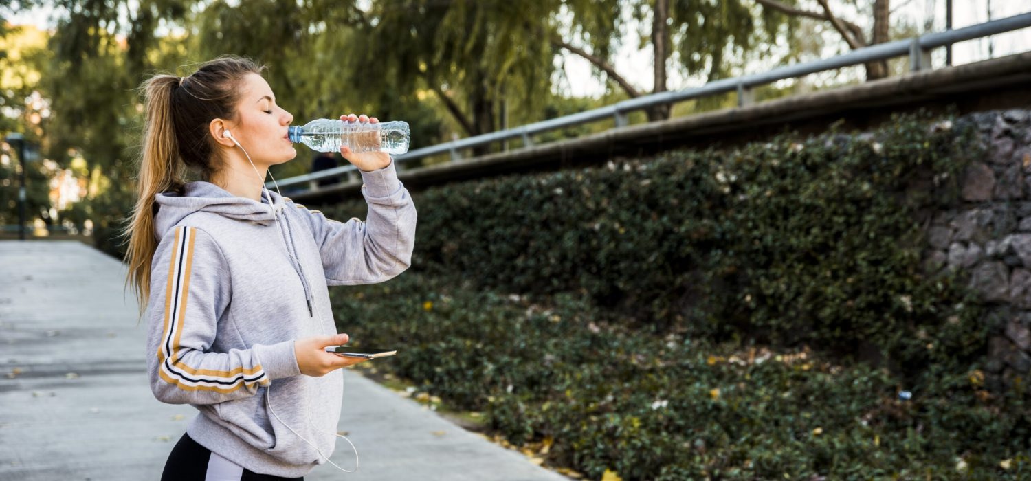 young-woman-drinking-water-from-bottle Diarrhea